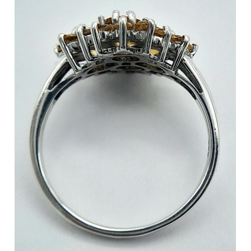 676 - An Elegant Sterling Silver Citrine and Diamond Ring Size O. The Crown measures 1.5cm Diameter and th... 