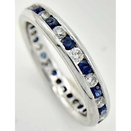 79 - AN 18K WHITE GOLD DIAMOND & SAPPHIRE FULL ETERNITY RING 0.30CT. 3G TOTAL WEIGHT. SIZE J. Ref: TAN 10... 