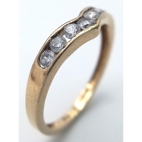 91 - Classic 9 CARAT GOLD WISHBONE RING. Pave set with sparkling  ZIRCONIA GEMSTONES. Full UK hallmark .1... 