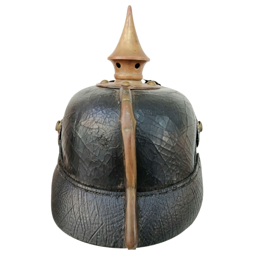 92 - A 1891 Pattern Prussian Pickelhaube. With Wappen plate, cockcades, chinstrap, spike and liner. Unit ... 