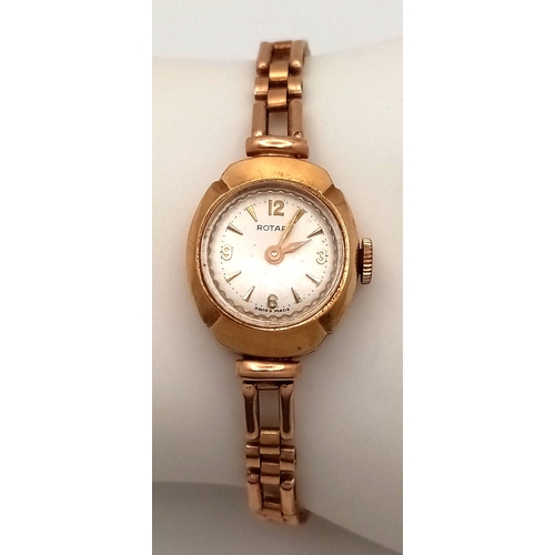 633 - A Vintage 9K Yellow Gold Rotary Watch. 9K gold bracelet and case - 18mm. White dial. Mechanical, han... 