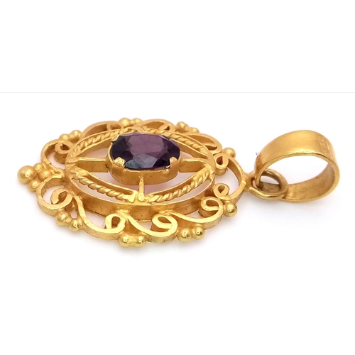 103 - A Mesmerising 22K Gold Decorative Pendant with an Oval Cut Central Alexandrite. 4cm. 5.25g total wei... 