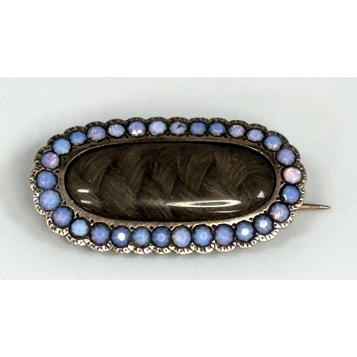 1386 - An Antique Victorian 9K Gold and Opal Mourning Brooch. Hair memento with opal surround. 3cm. 4.5g to... 