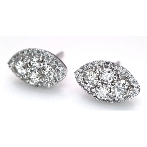 433 - A Pair of 9k White Gold Diamond Cluster Stud Earrings. 1ctw of round cut diamonds in a marquise shap... 