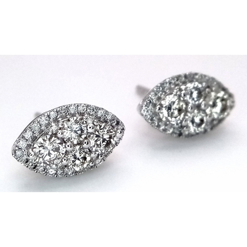 433 - A Pair of 9k White Gold Diamond Cluster Stud Earrings. 1ctw of round cut diamonds in a marquise shap... 