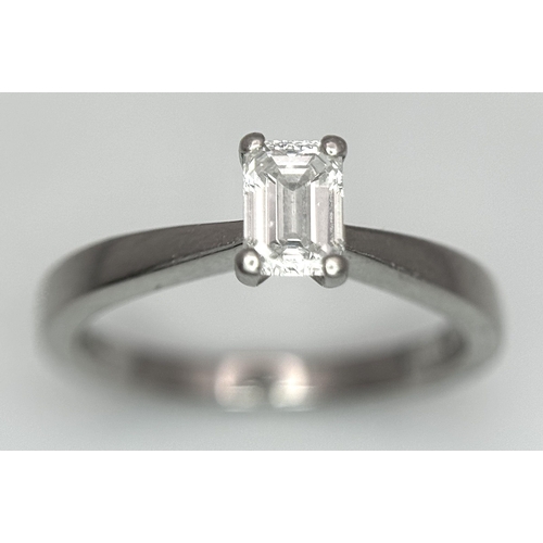 402 - An Emerald Cut Diamond Solitaire Ring. This 0.41ct diamond (VVS/F) is set in 950 Platinum. Size J 1/... 