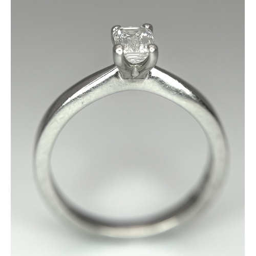 402 - An Emerald Cut Diamond Solitaire Ring. This 0.41ct diamond (VVS/F) is set in 950 Platinum. Size J 1/... 