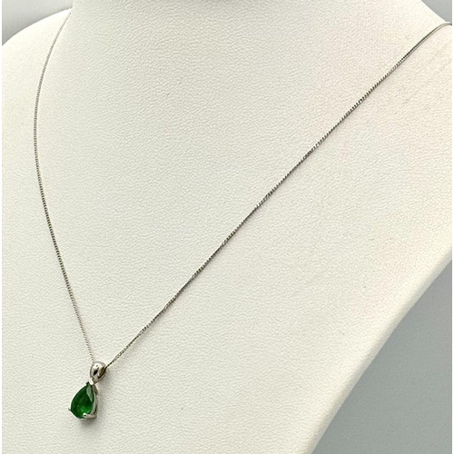 416 - An Emerald Teardrop Gemstone set in Platinum on a Disappearing 950 Platinum Italian Necklace. 0.80ct... 