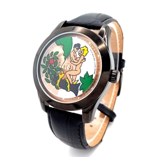 986 - An Adam and Eve Automatic Erotic Watch - Gold mine 18. 
Black leather strap. Steel and ceramic case ... 