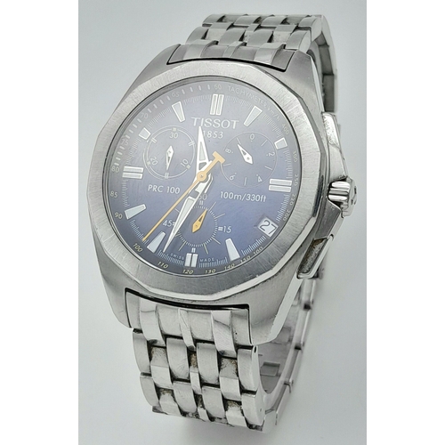 1138 - A Tissot PRC 100 Quartz Chronograph Gents Watch. Stainless steel bracelet and case - 42mm. Blue dial... 