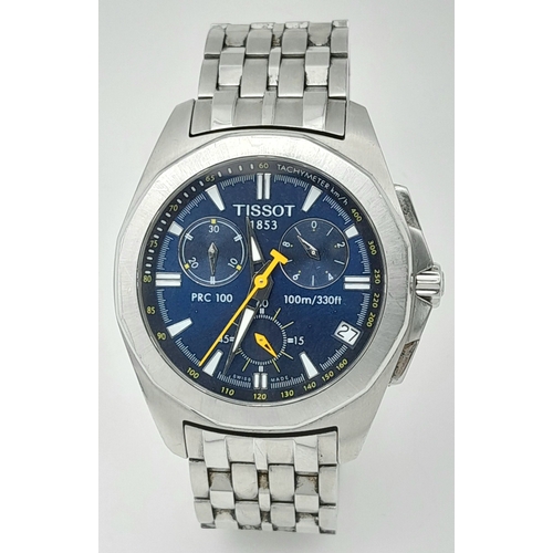 1138 - A Tissot PRC 100 Quartz Chronograph Gents Watch. Stainless steel bracelet and case - 42mm. Blue dial... 