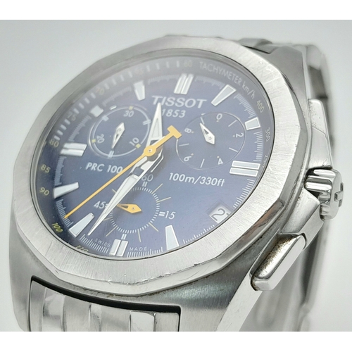 1138 - A Tissot PRC 100 Quartz Chronograph Gents Watch. Stainless steel bracelet and case - 42mm. Blue dial... 