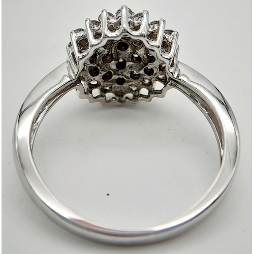 226 - A 9K WHITE GOLD DIAMOND CLUSTER RING. 0.50CT. 5.1G IN WEIGHT. SIZE U. Ref: SC 1021