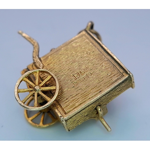 233 - A 9K YELLOW GOLD VINTAGE ORGAN GRINDER & MONKEY CHARM. 5.2G TOTAL WEIGHT. APPROX. 1.8CM IN HEIGHT AN... 