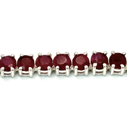 235 - A 925 silver ruby gemstone tennis necklace. Round-cut ruby stones. Total length: 45.5cm. Total weigh... 