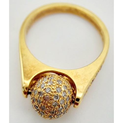 30 - AN 18K YELLOW GOLD DIAMOND SET SPINNING BALL TOP RING. 0.92CT. 6.25G TOTAL WEIGHT. SIZE M. Ref: TAN ... 