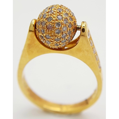 30 - AN 18K YELLOW GOLD DIAMOND SET SPINNING BALL TOP RING. 0.92CT. 6.25G TOTAL WEIGHT. SIZE M. Ref: TAN ... 