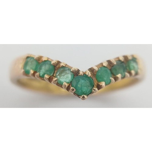 359 - AN 18K YELLOW GOLD EMERALD SET BAND RING. 1.83G TOTAL WEIGHT. SIZE K AND 1/2. Ref: SC 1054