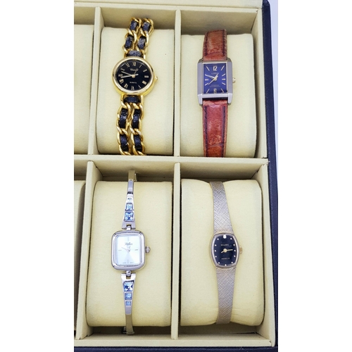 396 - A Ten Watch Display Box Containing Ten Ladies  Watches Comprising: 1) A Seiko Model 6530-5500. 2) An... 