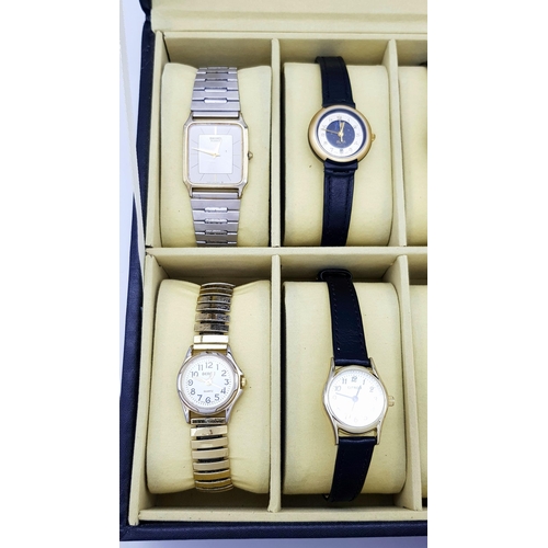 396 - A Ten Watch Display Box Containing Ten Ladies  Watches Comprising: 1) A Seiko Model 6530-5500. 2) An... 