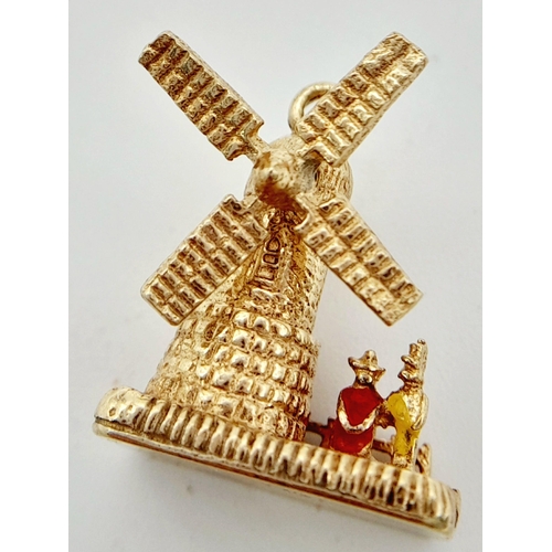 429 - A 9K YELLOW GOLD WINDMILL CHARM WITH MOVING PARTS. 3.67G TOTAL WEIGHT. APPROX. 1.8CM IN HEIGHT AND 1... 