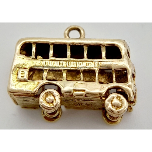 464 - A 9K YELLOW GOLD DOUBLE DECKER LONDON BUS CHARM. 3.2G TOTAL WEIGHT. APPROX. 1.2CM IN HEIGHT AND 1.7C... 