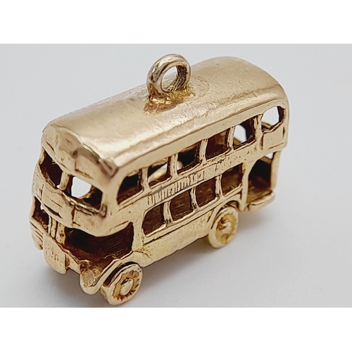 464 - A 9K YELLOW GOLD DOUBLE DECKER LONDON BUS CHARM. 3.2G TOTAL WEIGHT. APPROX. 1.2CM IN HEIGHT AND 1.7C... 