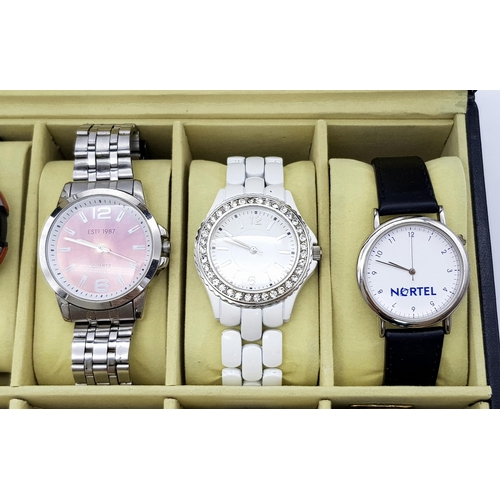 508 - A Ten Watch Display Box Comprising of Ten Men’s and Ladies Watches. Contains:- 1) A Men’s ID London ... 