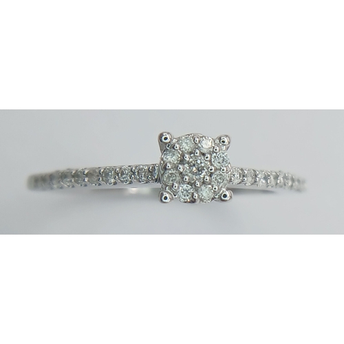 541 - A 9K WHITE GOLD DIAMOND RING 0.14CT. 1.78G IN WEIGHT. SIZE L AND 1/2. Ref: SC 1017