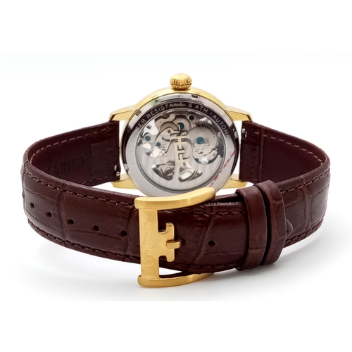 592 - A Thomas Earnshaw Padstow Skeleton Automatic Gold Tone Watch Model ES-8149-04. 39mm Case. Complete w... 