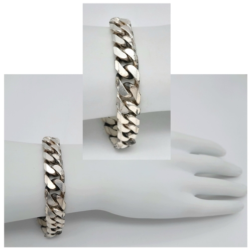 597 - A STERLING SILVER CURB BRACELET 53.3G IN WEIGHT. APPROX. 21CM IN LENGTH. Ref: SC 1071