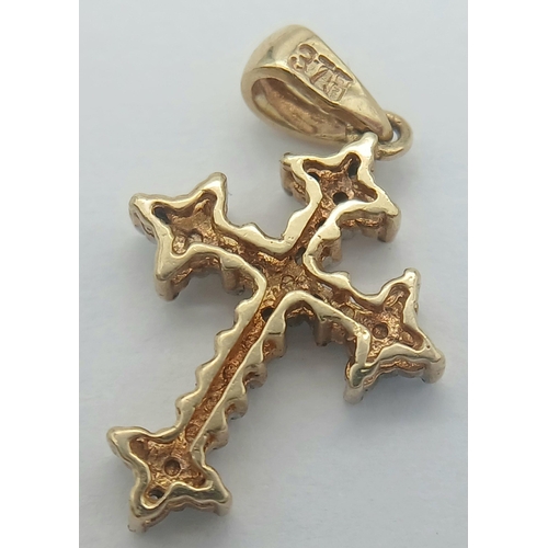 766 - A 9K YELLOW GOLD DIAMOND SET CROSS. 0.93G TOTAL WEIGHT. 2 X 1.2CM Ref: SC 1039