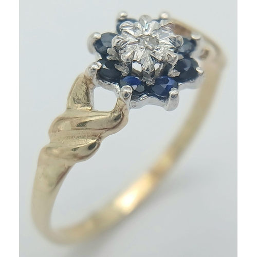 786 - A 9K YELLOW GOLD DIAMOND & SAPPHIRE RING. 1G TOTAL WEIGHT. SIZE I AND 1/2. Ref: SC 1026