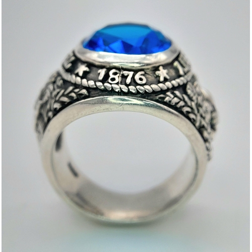 927 - A STERLING SILVER STONE SET TEXAS UNIVERSITY RING 1876. 15.45G TOTAL WEIGHT. SIZE R. Ref: 8425