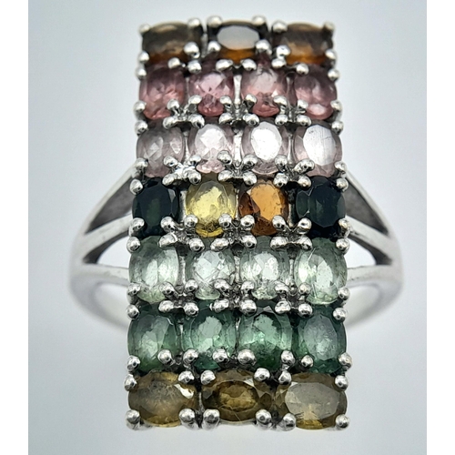 957 - A Sterling Silver Multi-Semi Precious Gemstone Set Ring Size S. The Ring Measures 2.7cm Length. Gros... 