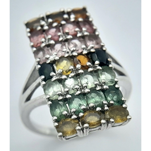 957 - A Sterling Silver Multi-Semi Precious Gemstone Set Ring Size S. The Ring Measures 2.7cm Length. Gros... 