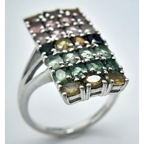 957 - A Sterling Silver Multi-Semi Precious Gemstone Set Ring Size S. The Ring Measures 2.7cm Length. Gros... 