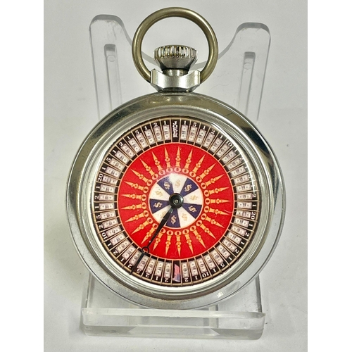 1091 - A Vintage spinning gaming pocket watch . When round mechanical arm spins landing randomly on a diffe... 