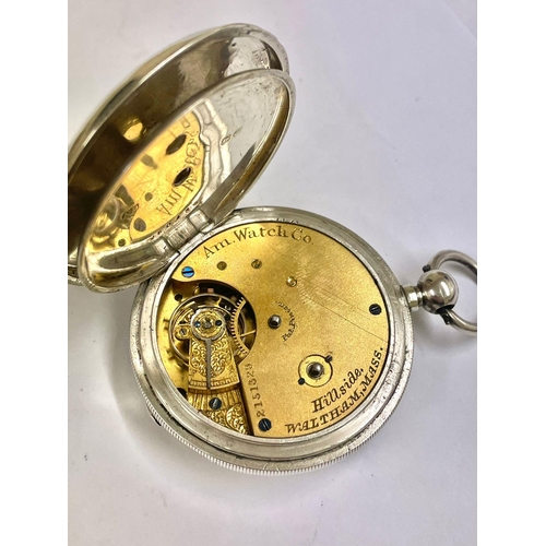 636 - A Silver Waltham full hunter pocket watch. In working order.