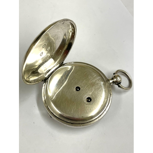 636 - A Silver Waltham full hunter pocket watch. In working order.