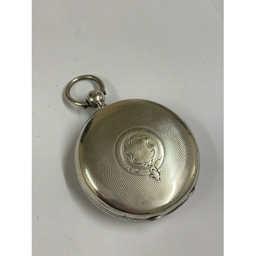 636 - A Silver Waltham full hunter pocket watch. In working order.