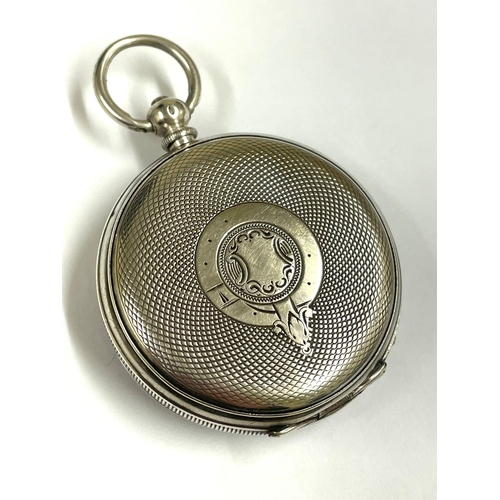 670 - An Antique silver full hunter pocket watch, working but missing glass .