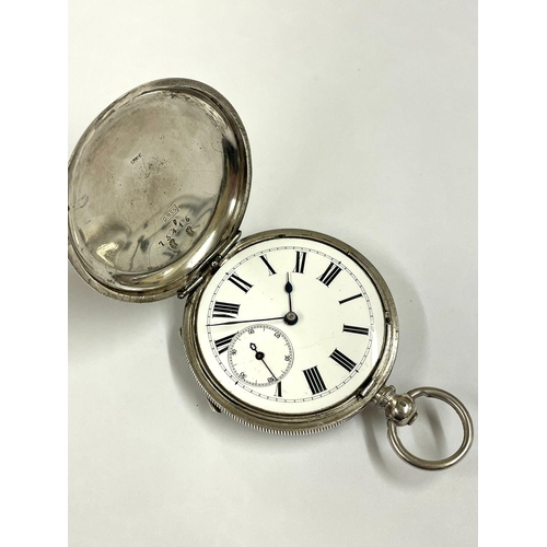 670 - An Antique silver full hunter pocket watch, working but missing glass .