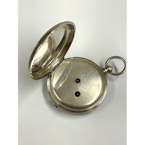 670 - An Antique silver full hunter pocket watch, working but missing glass .