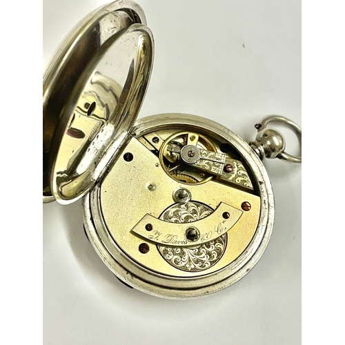 677 - An Antique silver full hunter pocket watch. In working order, ticks / stops , missing glass as found... 