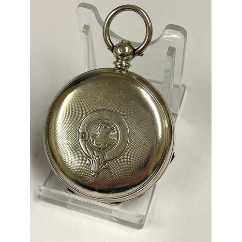 692 - An Antique gents silver full hunter pocket watch. In Working order, but missing glass.