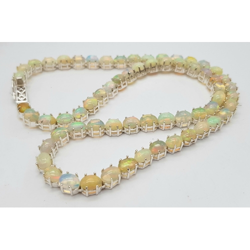 200 - A 925 silver opal gemstone tennis necklace. Oval-cut opal stones. Total length: 46cm. Total weight: ... 