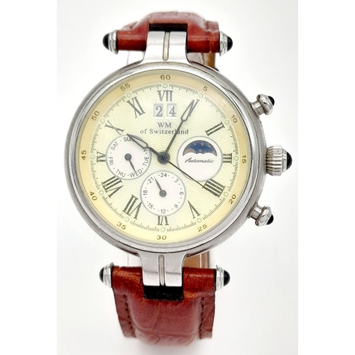 250 - A WM of Switzerland Automatic Gents Watch. Brown leather strap. Stainless steel case - 40mm. Pastel ... 