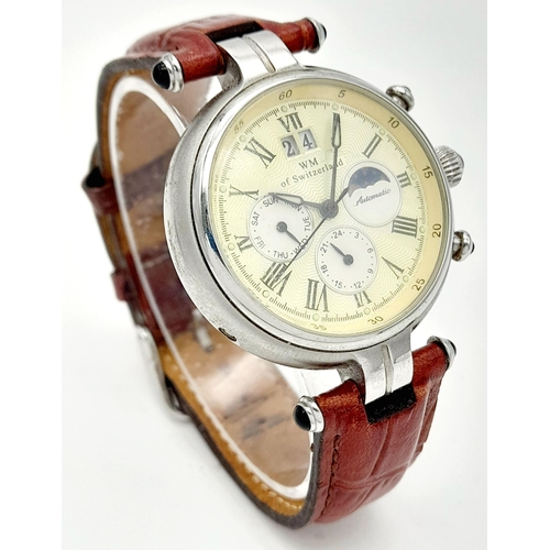 250 - A WM of Switzerland Automatic Gents Watch. Brown leather strap. Stainless steel case - 40mm. Pastel ... 