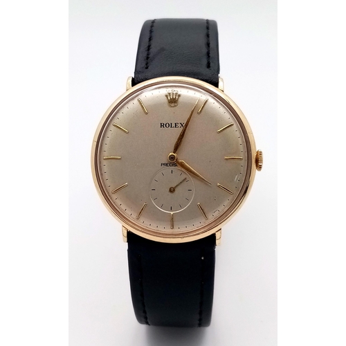 46 - A Stylish 1960s 9K Gold Cased Rolex Precision Gents Watch. New black leather strap. 9K gold case - 3... 